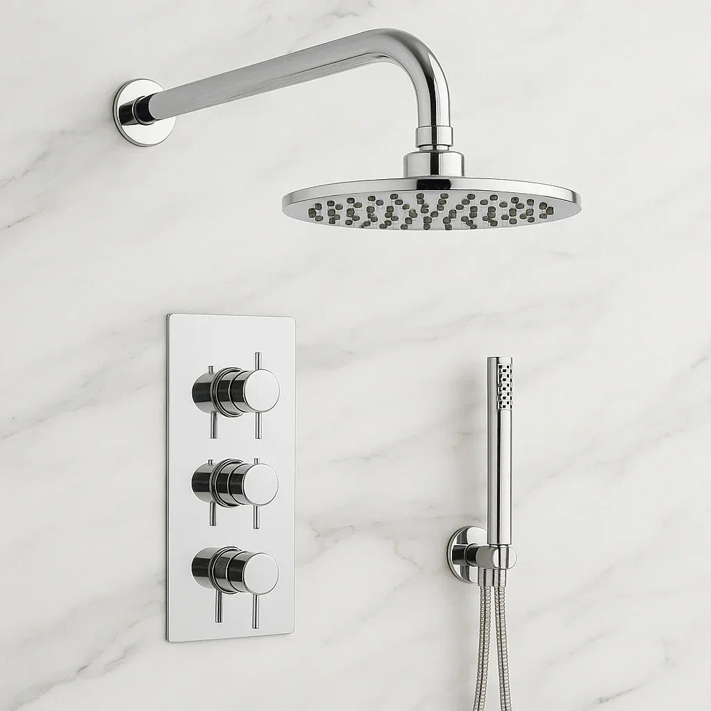 Chrome shower head and control panel on a marble wall