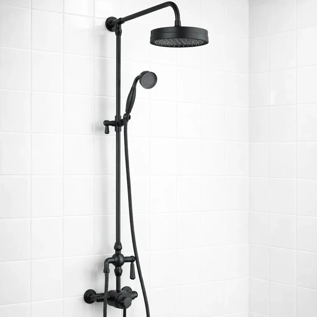 Black shower head and hose on a white tiled wall
