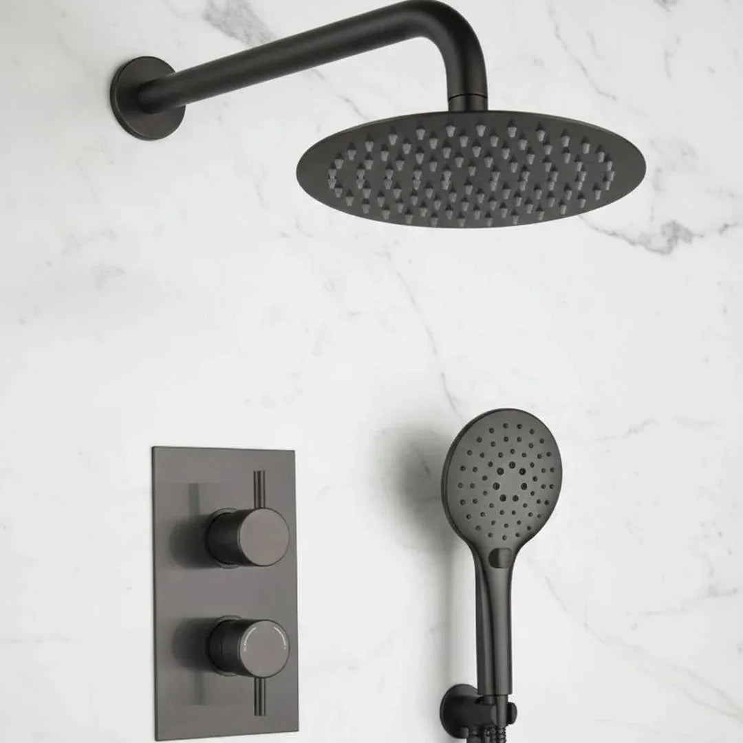 Black shower head, handheld shower, and control panel on a marble background