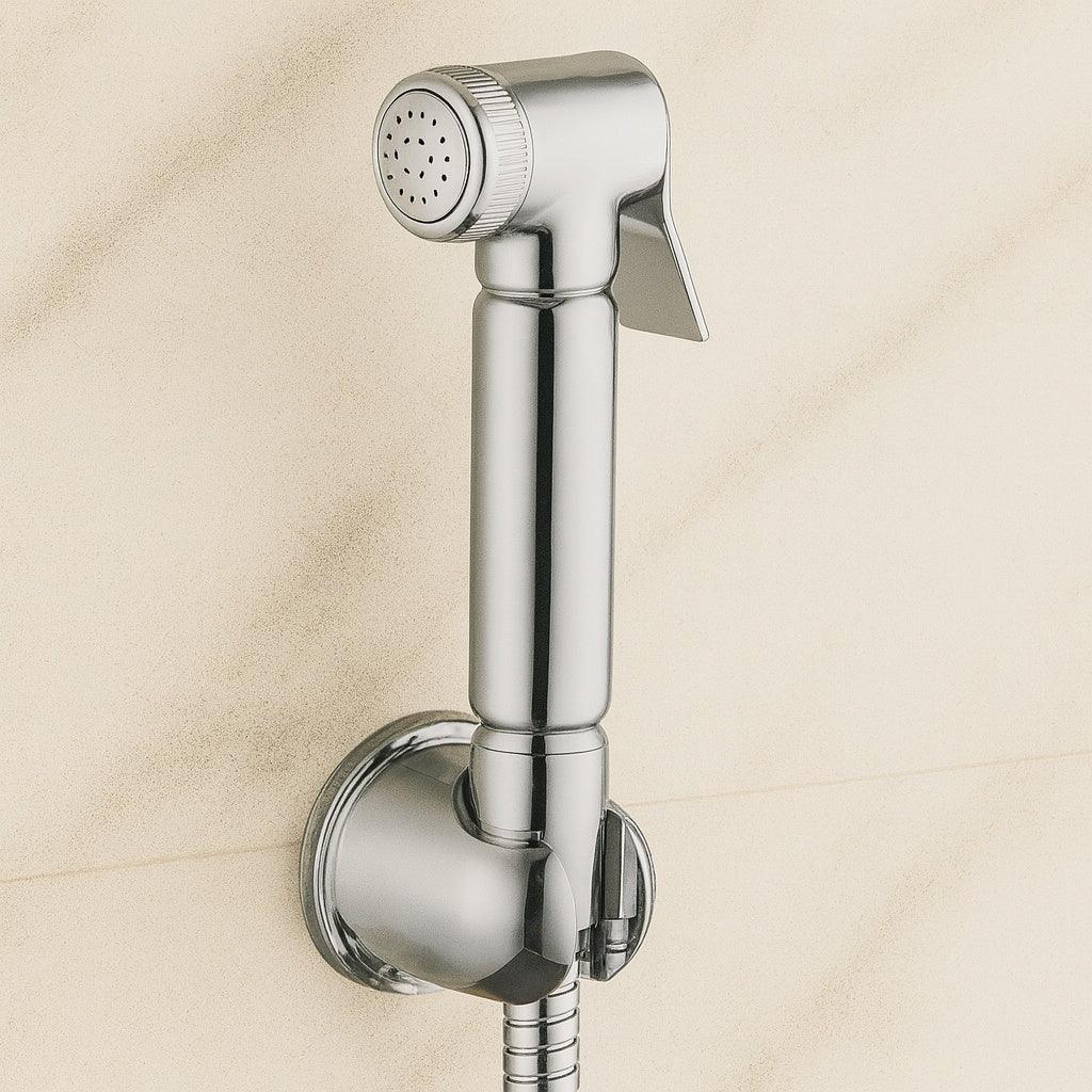 Chrome handheld shower head on a beige tiled wall background