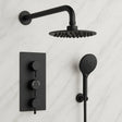Black shower head and control panel set on a light gray background