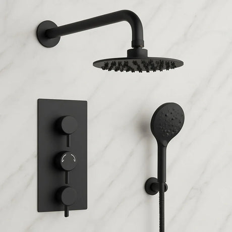 Black shower head and control panel set on a light gray background