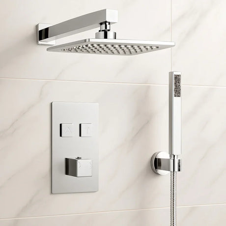 Chrome shower head and control panel mounted on a tiled bathroom wall.