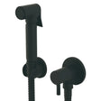 Black handheld shower head and wall-mounted valve on a white background