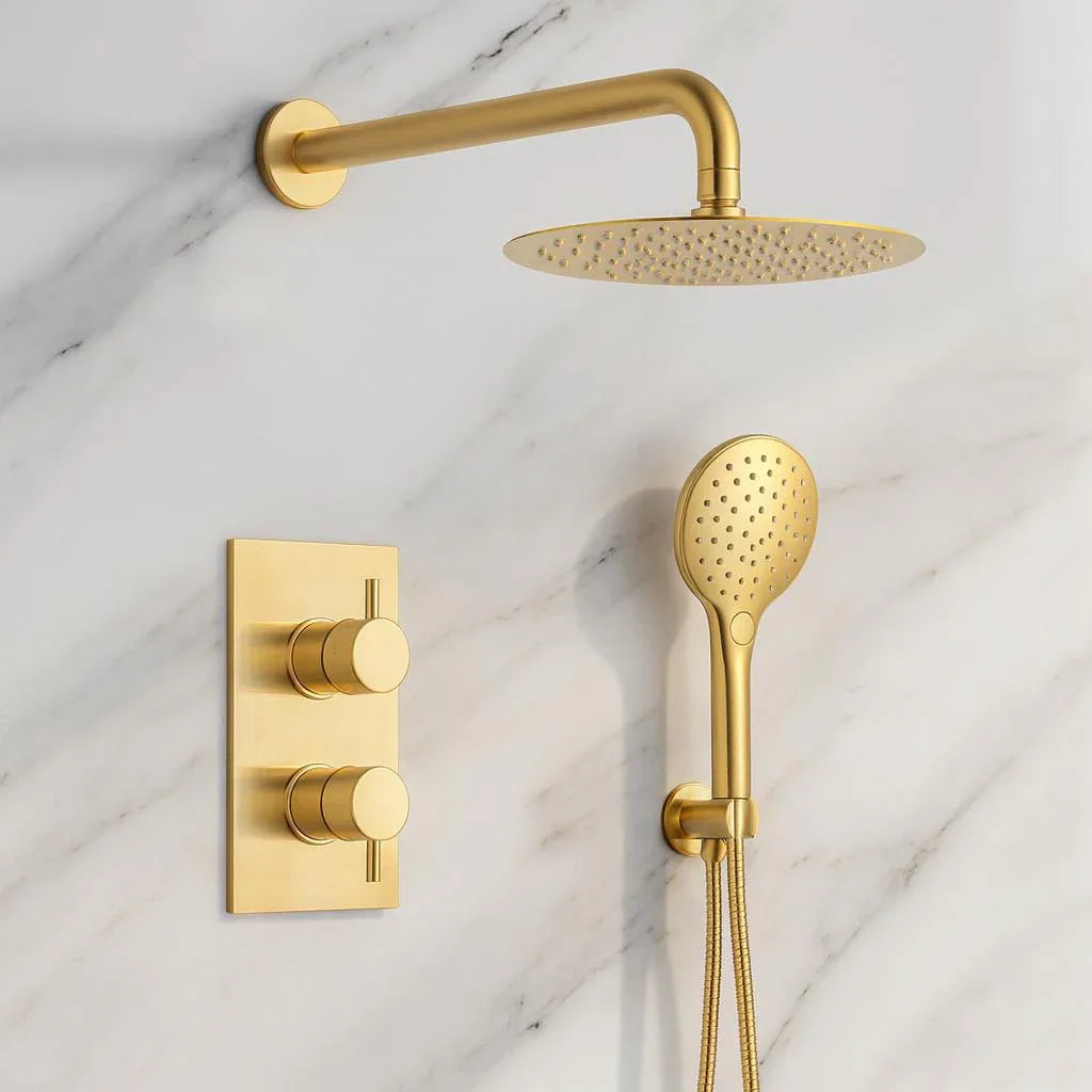 Gold shower set with shower head and control valve on a marble background