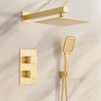 Gold shower head and control valve set on a marble background