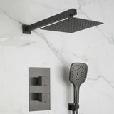 Black shower head, rectangular shower arm, and handheld shower on a marble wall.