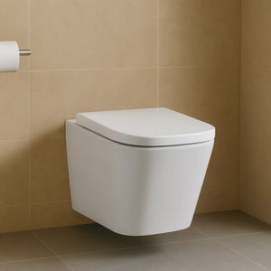 Wall-mounted white toilet against a beige tiled wall