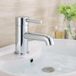 Chrome faucet on a sink with a blurred background