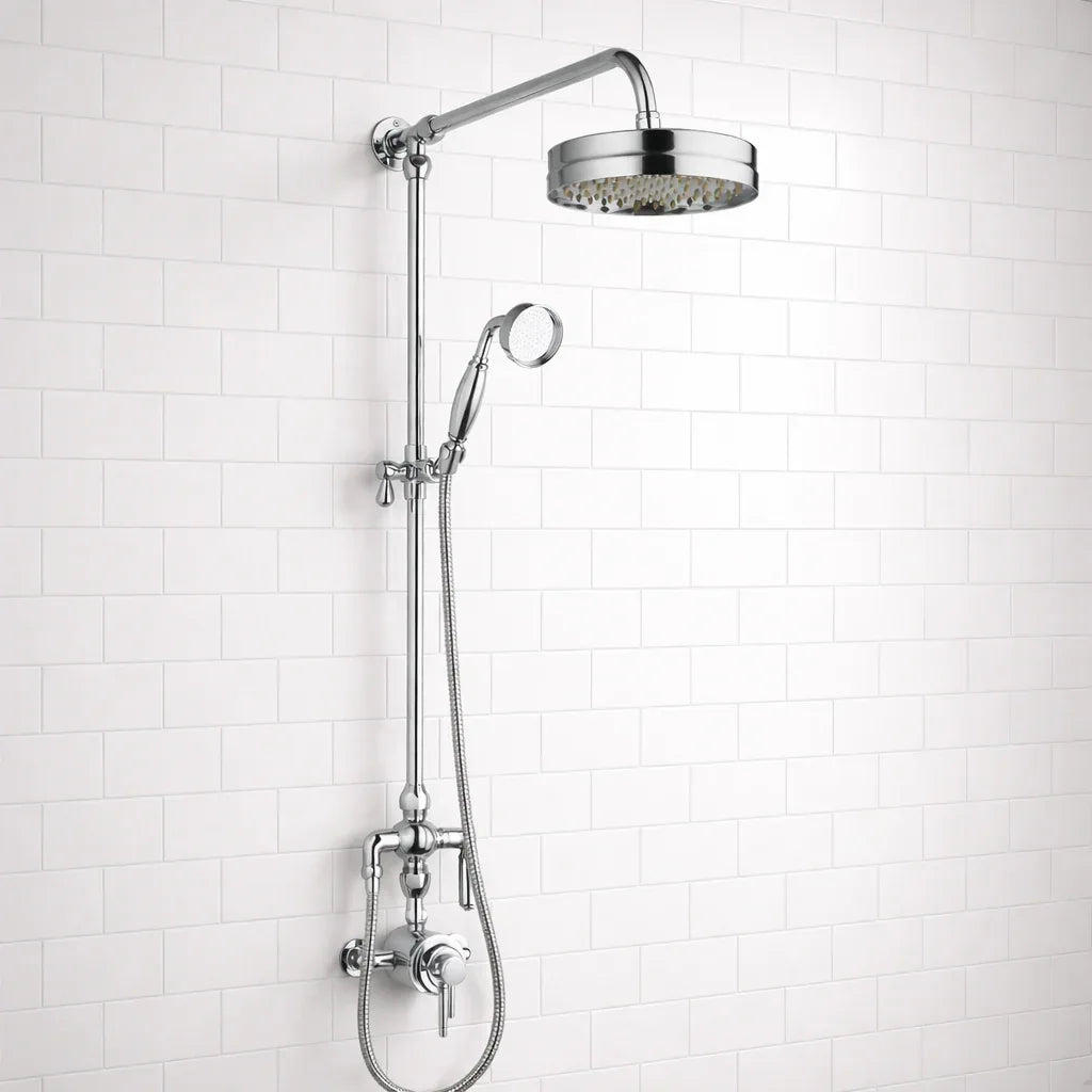 Chrome shower head and hose against a white tiled wall