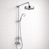 Chrome shower head and hose against a white tiled wall