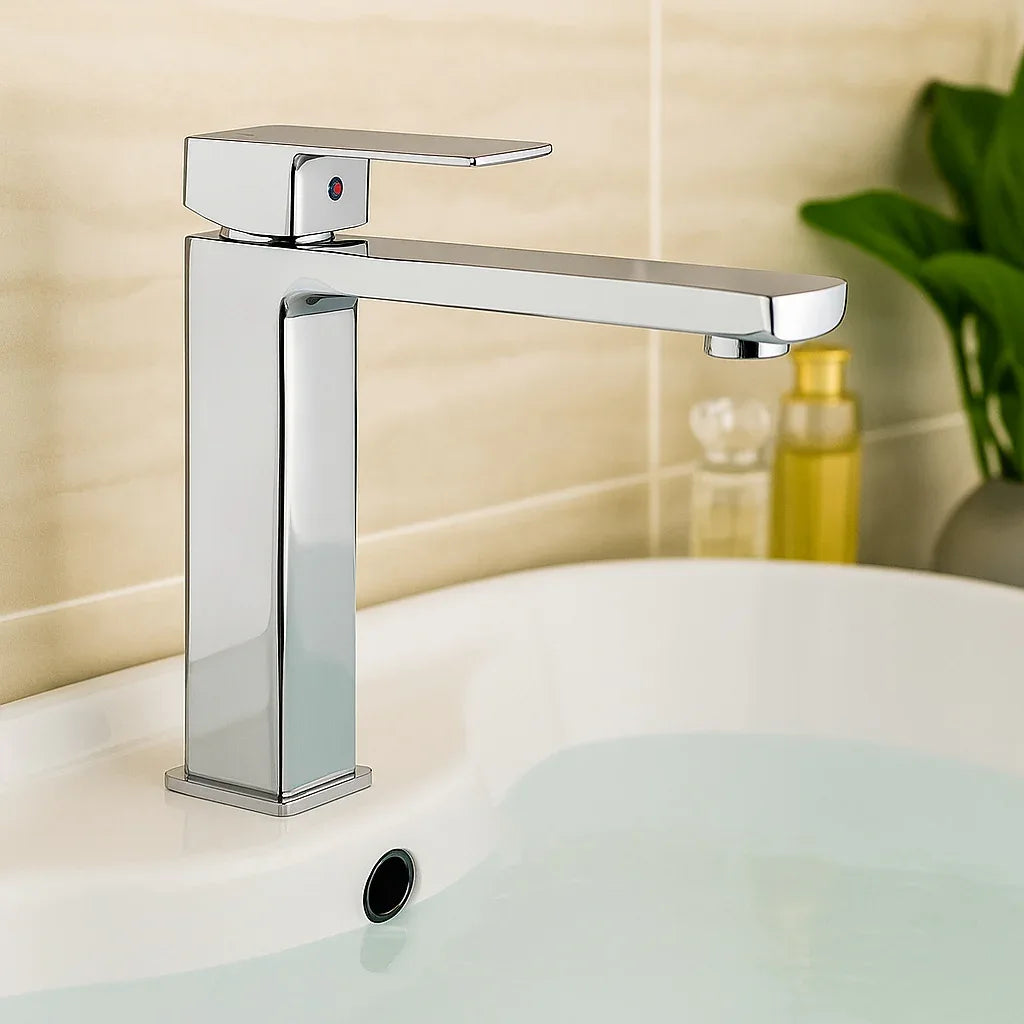 Chrome bathroom faucet on a sink with a blurred background